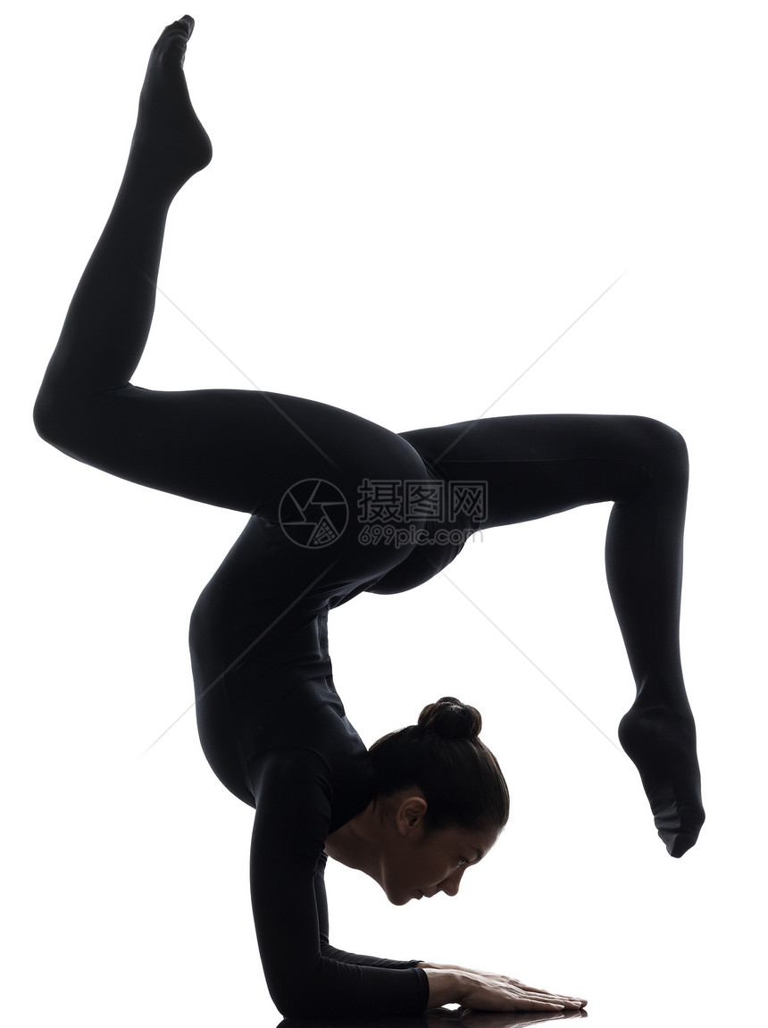 从事体操瑜伽的女听力运动者地面姿势表演者阴影舞蹈演员锻炼灵活性女士女孩图片