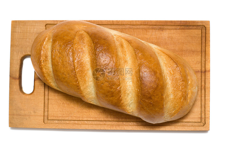 在面包板上面包面包上的白色背景孤立桌子黄油面粉蛋糕午餐饮食木板甜点面包产品图片