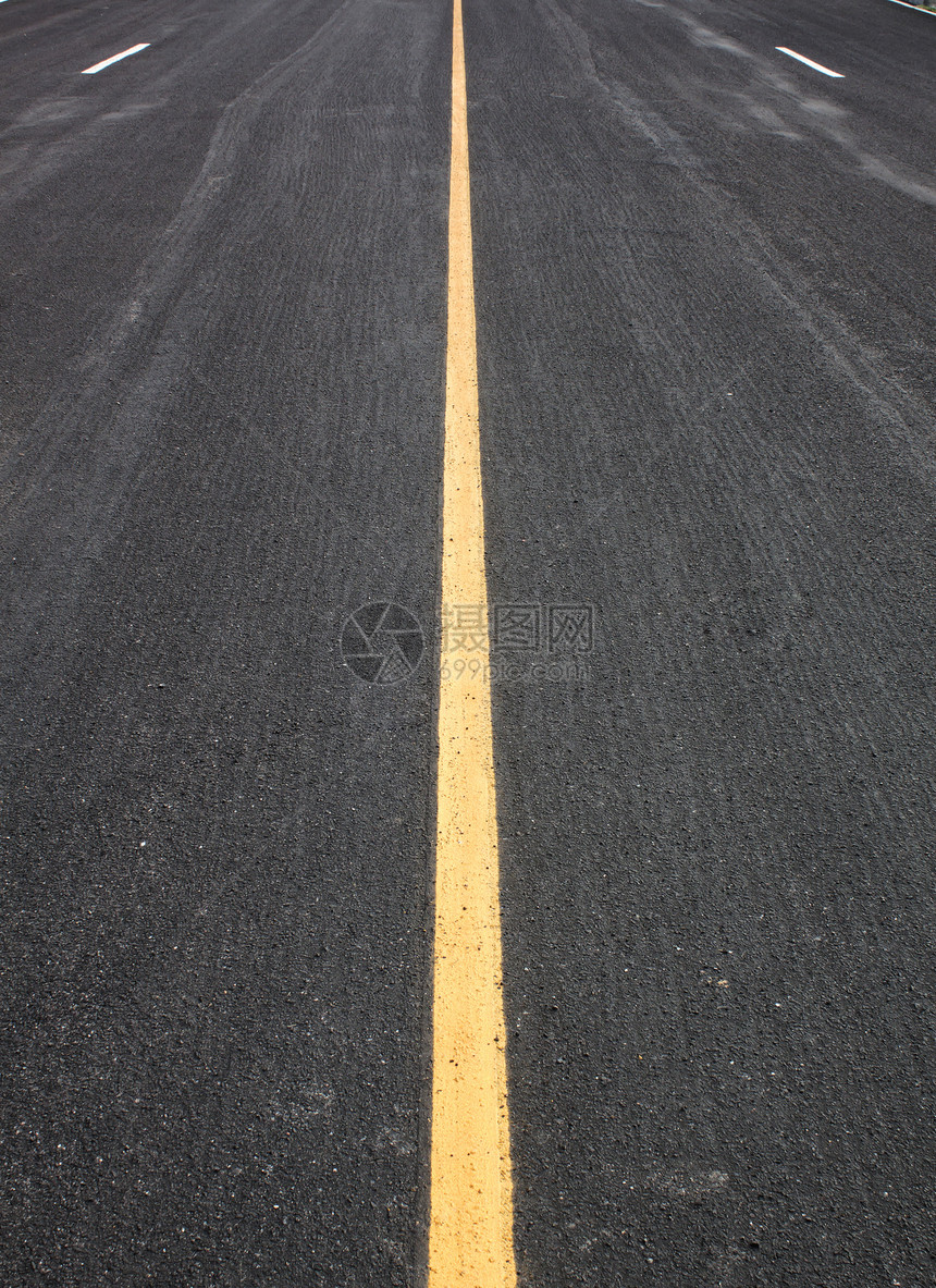 阿斯法特路黑色纹理单线颗粒状黄色宏观街道条纹运输边界图片