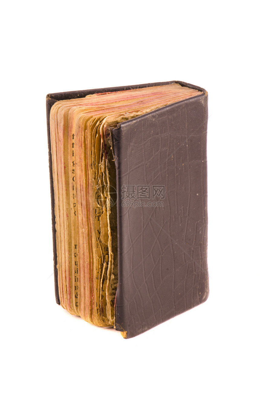 圣经在白色上隔绝的圣经 旧用的基督教圣经祷告书图片