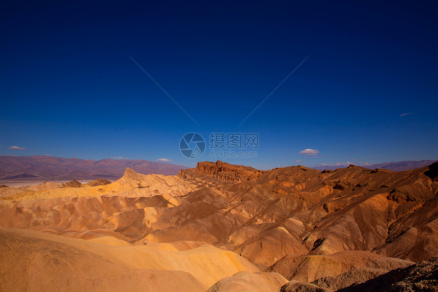 加利福尼亚州Zabriskie地区死亡谷国家公园天空旅行砂岩沙丘气候土地国家荒地死亡丘陵图片