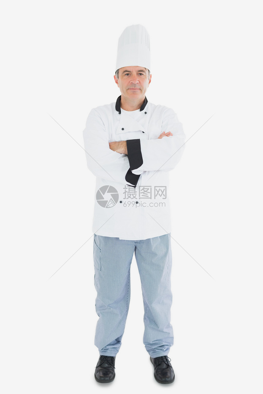 手交叉的成熟厨师肖像图片