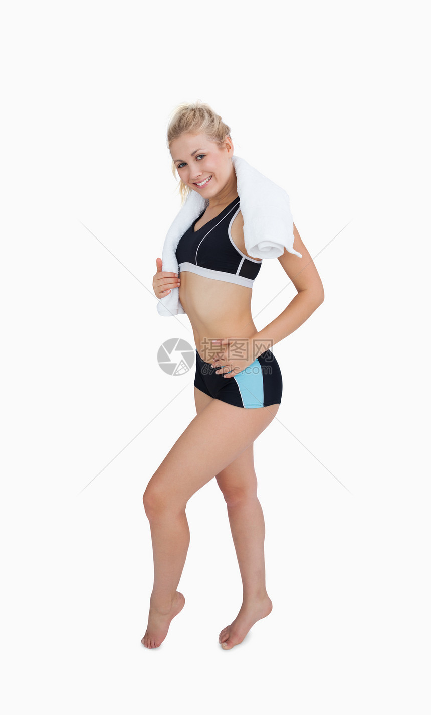 快乐的年轻女子穿运动服 举起拇指图片