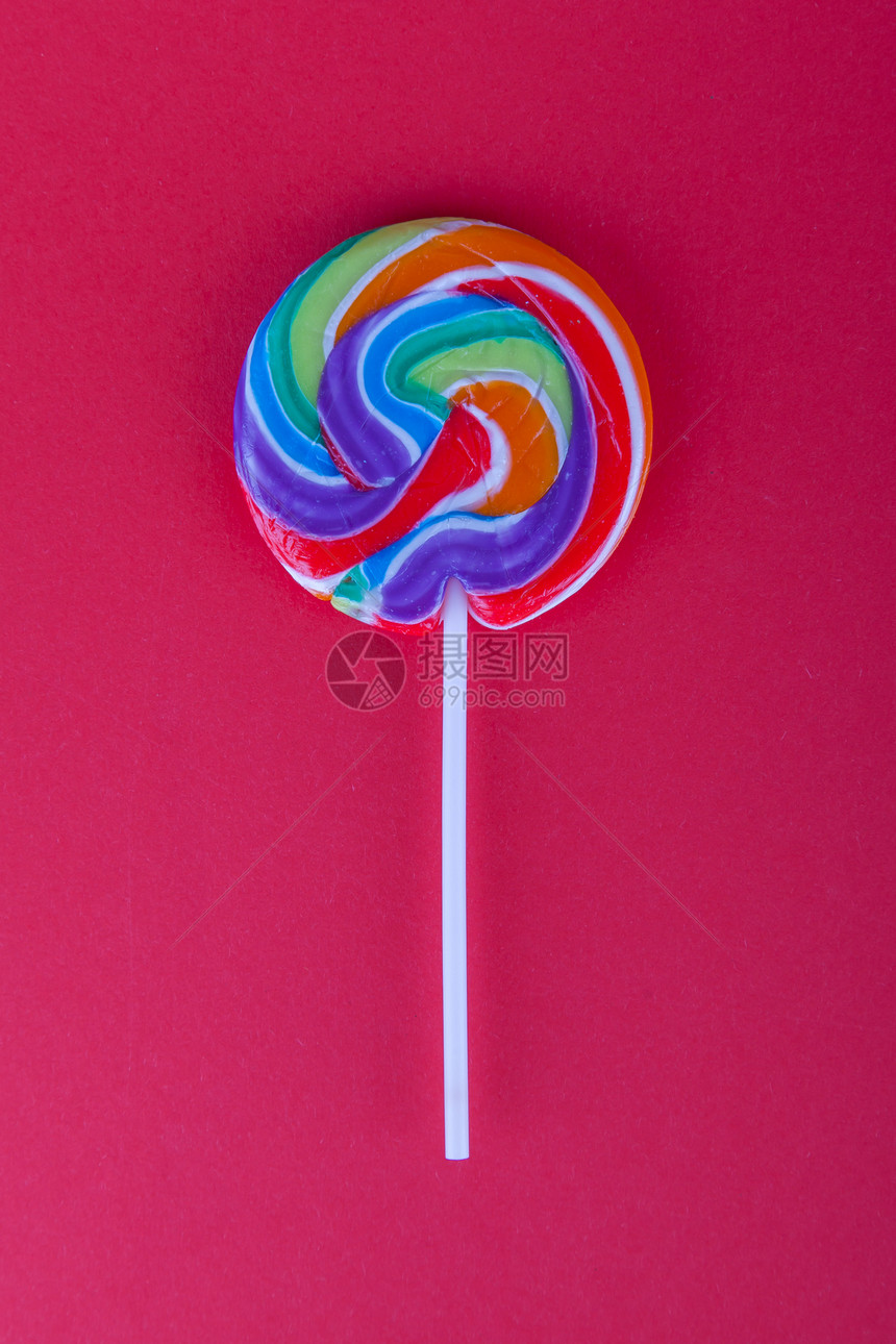孤立的Lollypopop饮食笨蛋漩涡漩涡状粉色背景螺旋食物红色图片