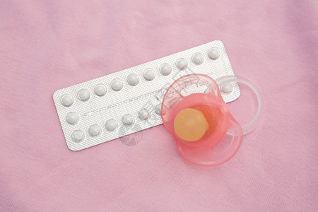 含有粉红大豆的避孕药包背景图片