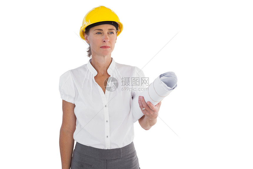 认真的女性建筑师持有计划和硬帽子的严肃女性建筑师图片