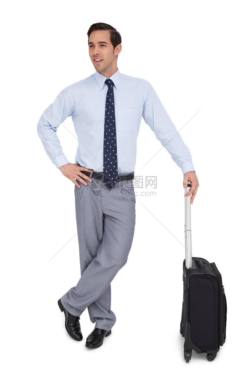 手持手提箱的有魅力的商务人士图片