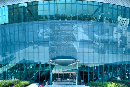 现代建筑的面孔镜子金融景观公司玻璃财产办公室市中心中心反射背景图片