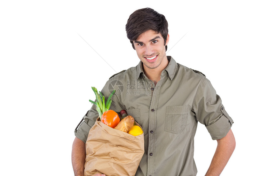 带购物袋的年轻人纸袋微笑蔬菜黑发快乐面包男人衬衫购物男性图片