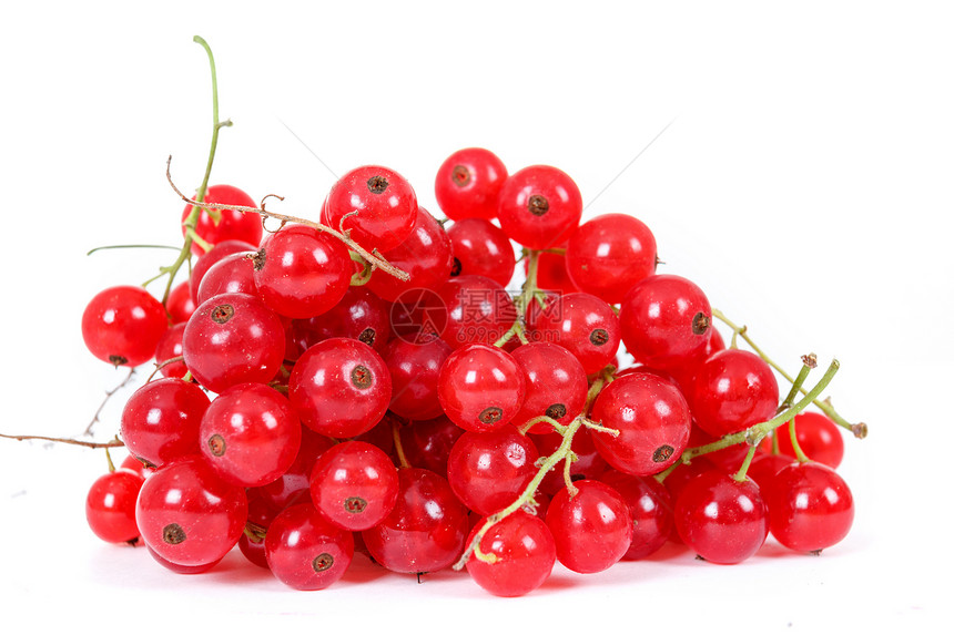 白色背景上红色卷曲的堆叠浆果收成食物工作室季节团体宏观甜点水果植物营养图片