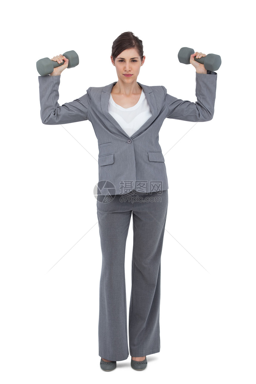 商业女商务人士装哑铃图片