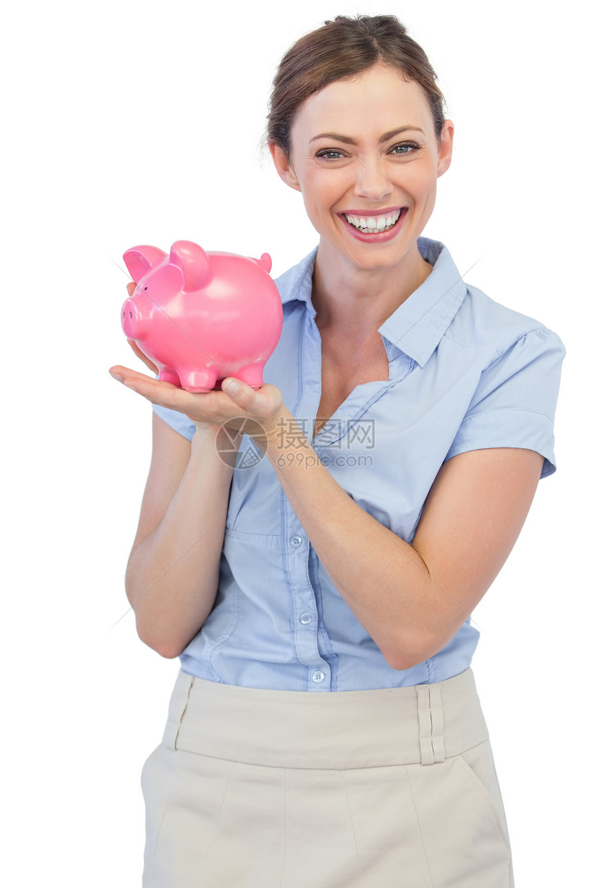 拥有小猪银行的开心女商务人士女士人士裙子商务存钱罐棕色经济女性金融头发图片