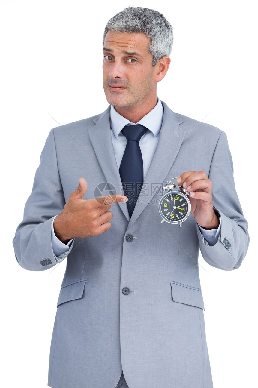持闹钟的商务人士头发商务套装时间人士公司手指衬衫商业领带图片