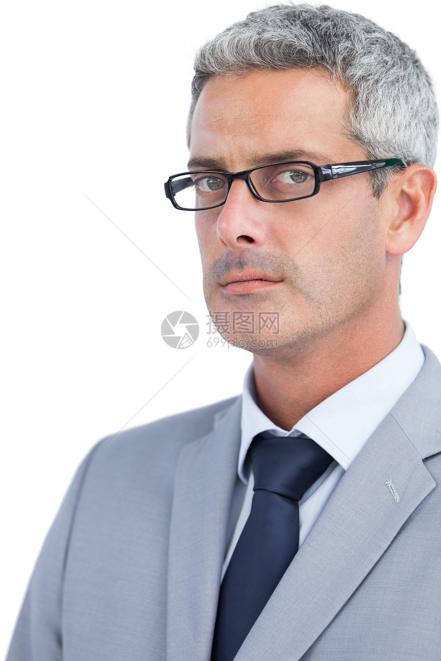 身戴眼镜的重度商务人士图片
