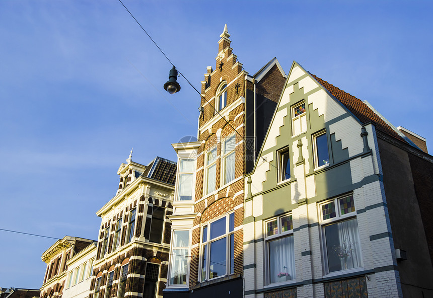 日落前古老典型的荷兰房子住宅城市石头旅行建筑学街道文化历史建筑物窗户图片