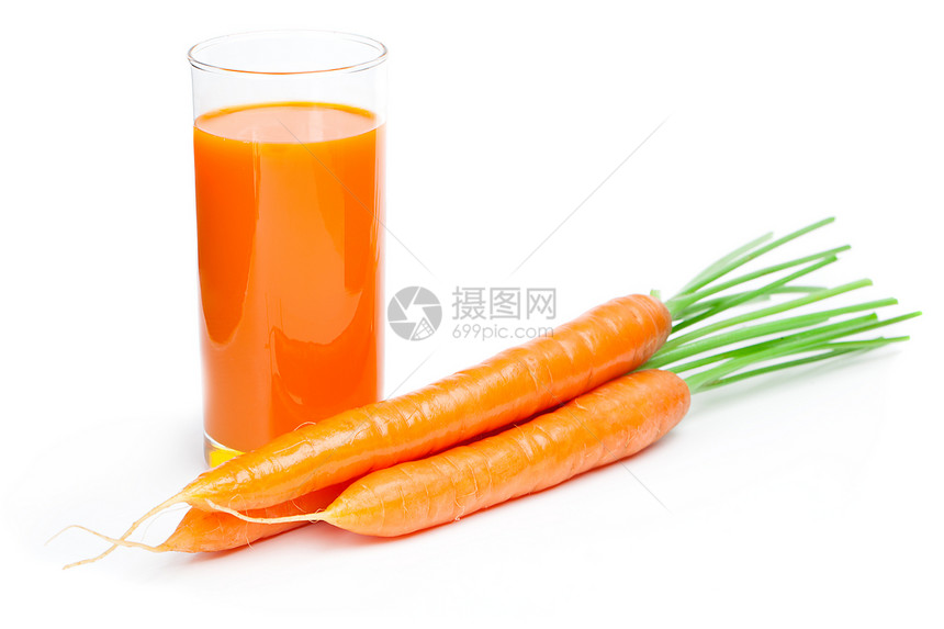 玻璃胡萝卜汁和新鲜的胡萝卜图片
