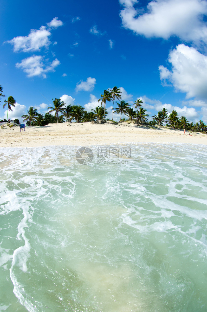 海滩沙滩热带海岸蓝色冲浪阳光旅行海浪海洋支撑天堂图片