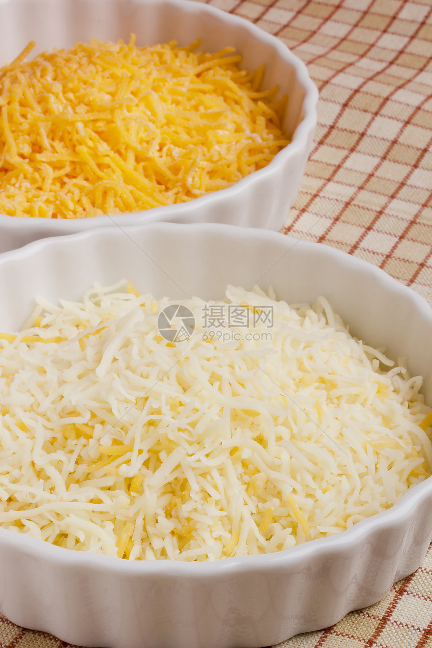 烤奶酪制品盘子食品烹饪成绩磨碎陶瓷产品橙子白色图片