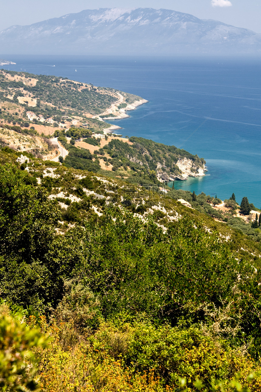 希腊Zakynthos岛的美丽海岸线 希腊白色山脉黄色蓝色风景薄雾海岸闲暇树木绿色图片