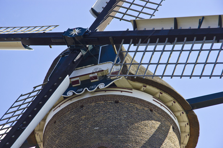 Alkmaar的风车蓝色旋转旅游农场活力环境绿色天空建筑学力量图片