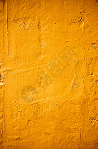 混凝土壁纹理背景的橙色背景图片