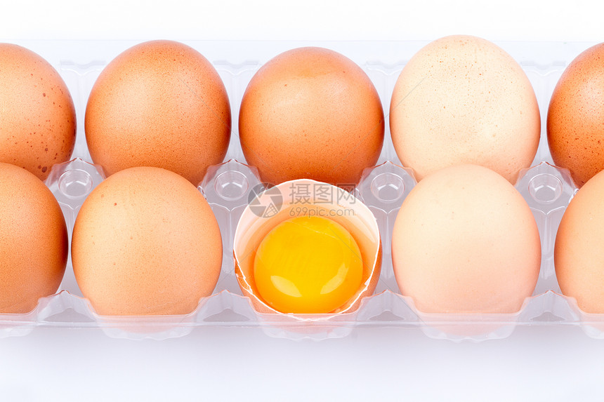 塑料透明包装袋中的鸡蛋和蛋黄棕色黄色食物包装纸盒产品农场团体托盘白色图片