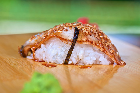 寿司单烟熏食物饮食鳗鱼海鲜午餐蔬菜美食黑头水果背景图片
