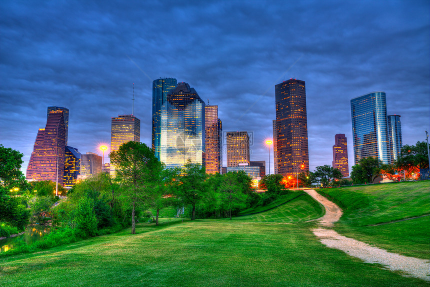 休斯顿德克萨斯州现代天线 在公园的日落黄昏时景观天空商业城市镜子办公室建筑物旅行市中心中心图片