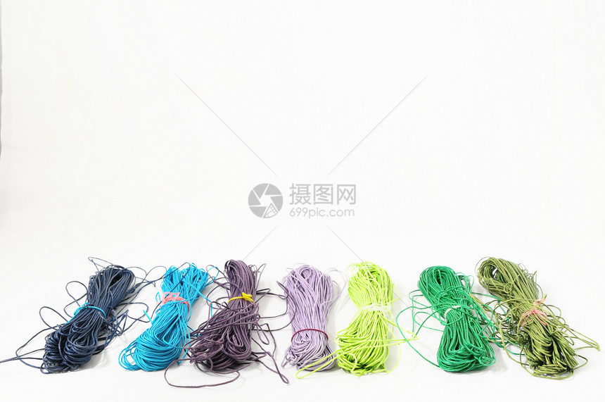 双线卷白色羊毛细绳金属管子纤维棉布故事螺旋绳索图片