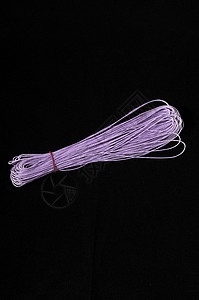 双线卷管子纤维细绳纺织品螺旋电缆针织白色金属羊毛背景图片