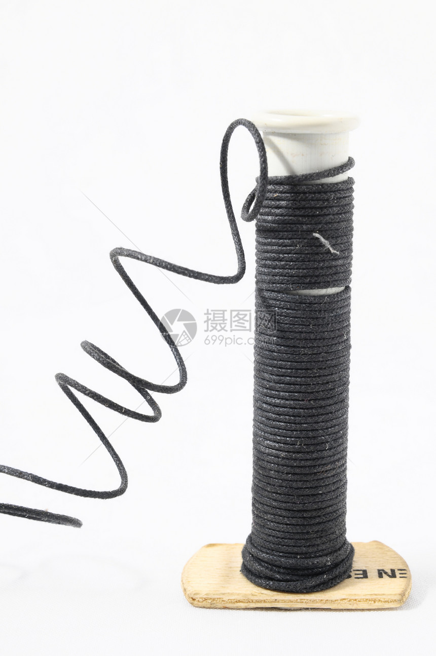 双线卷纤维绳索纺织品螺旋材料金属棉布白色故事针织图片