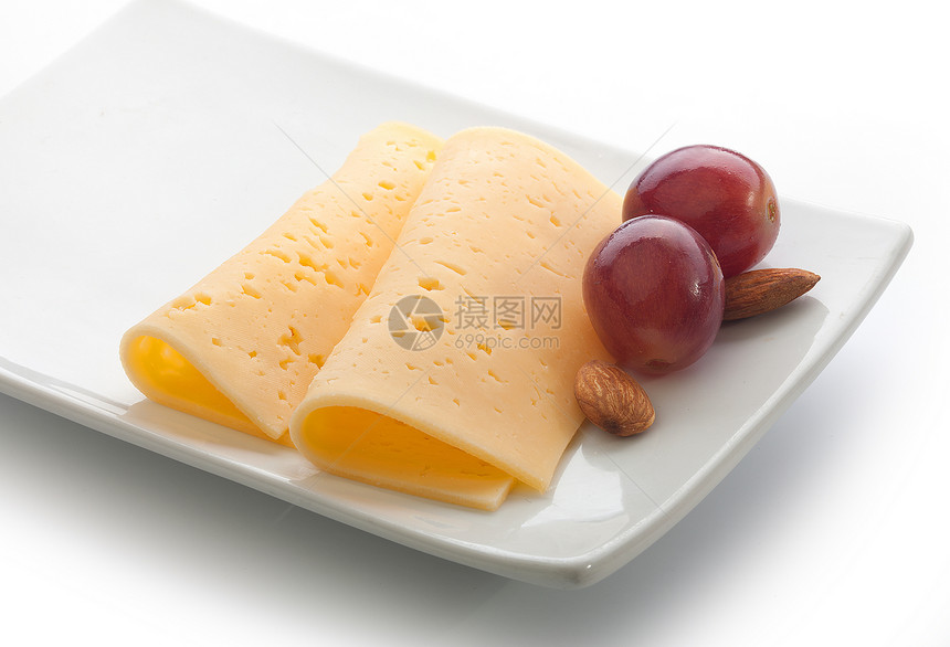 切片奶酪红色坚果杏仁奶制品水果白色产品盘子食物图片