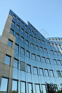 现代办公楼建筑房子反射商业蓝天办公室玻璃背景图片