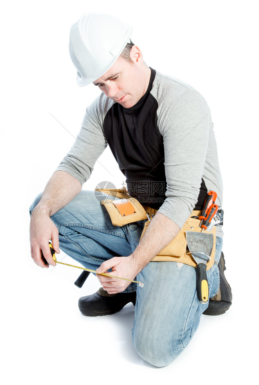 白种男子合同承包商 40岁修理测量工具木匠建筑工人愤怒建筑统治者工匠思维图片