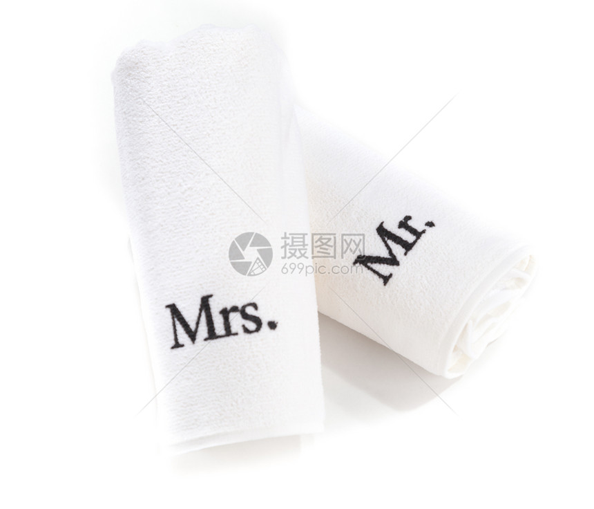 先生和夫人卷起白色毛巾 隔离在白色背景中太太温泉图片