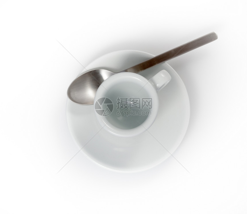 白色背景上隔绝的碟片中的空咖啡杯勺子餐具咖啡飞碟图片