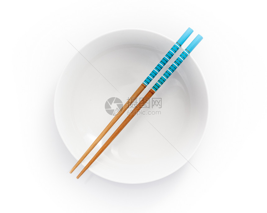 空碗中的筷子 在白色背景上被孤立餐具图片