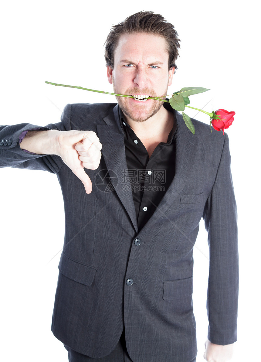 在演播室中拍摄的有吸引力的caucasian男子男人红玫瑰男性悲伤红色愤怒商务玫瑰白色情绪图片