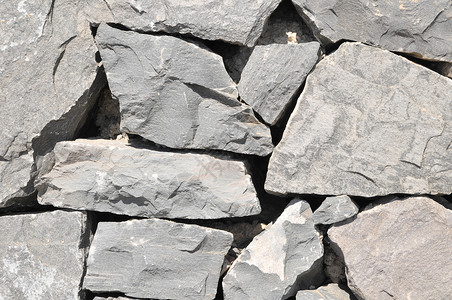灰岩古城墙建筑学鹅卵石大理石黑色水泥石头纹理宏观矿物花岗岩背景图片