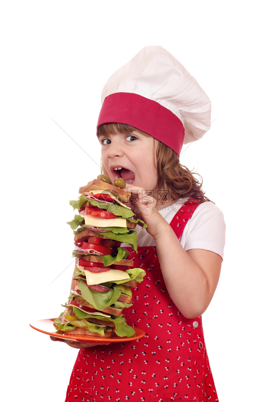饥饿的小女孩做饭吃大三明治图片