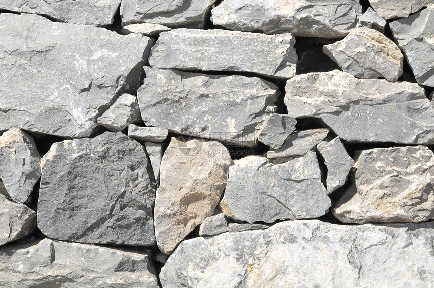 灰岩古城墙花岗岩宏观黑色鹅卵石水泥灰色建筑学材料纹理矿物图片