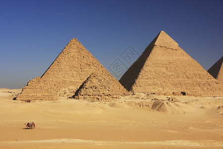 吉萨开罗吉扎金字塔金字塔狮身石头骆驼纪念碑人面沙漠地标大车风暴背景