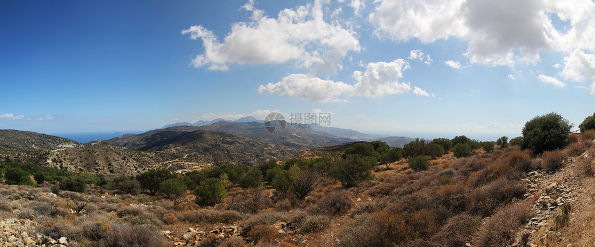 山区地貌山脉蓝色岩石植物山地天空树木太阳高度图片
