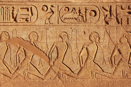 Abu Simbel大殿墙上的古代象形文字建筑废墟雕像建筑学考古学石棺宽慰雕刻地标王朝背景图片