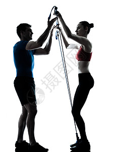 教练男人女人锻炼体操健身阴影松紧带训练情侣运动员讲师运动成年人有氧背景图片