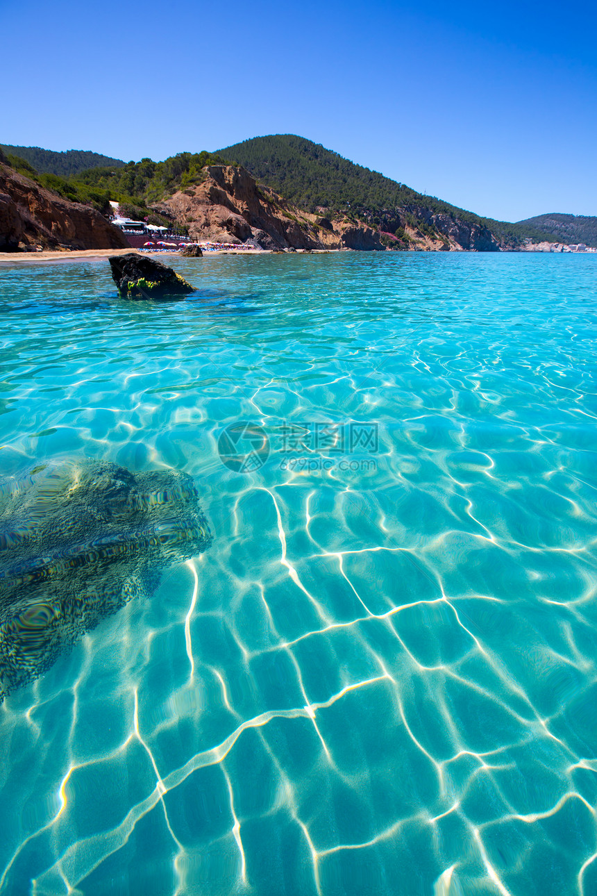 海滩 圣尤拉利亚天堂蓝色空白旅行岩石海洋悬崖油菜花胰岛海景图片