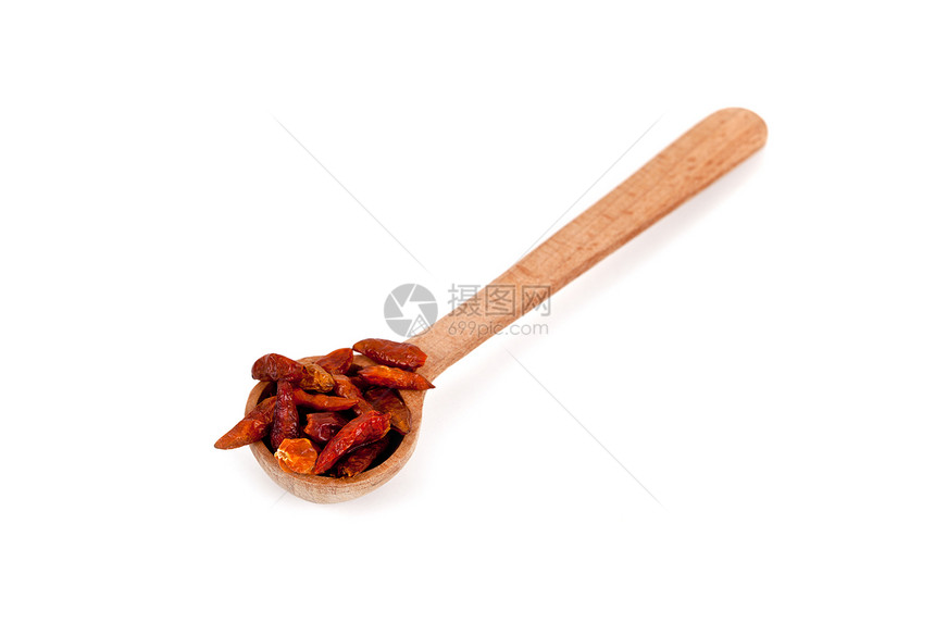木勺中的红辣椒胡椒粉木头白色美食烹饪调味品辣椒种子胡椒草本植物图片