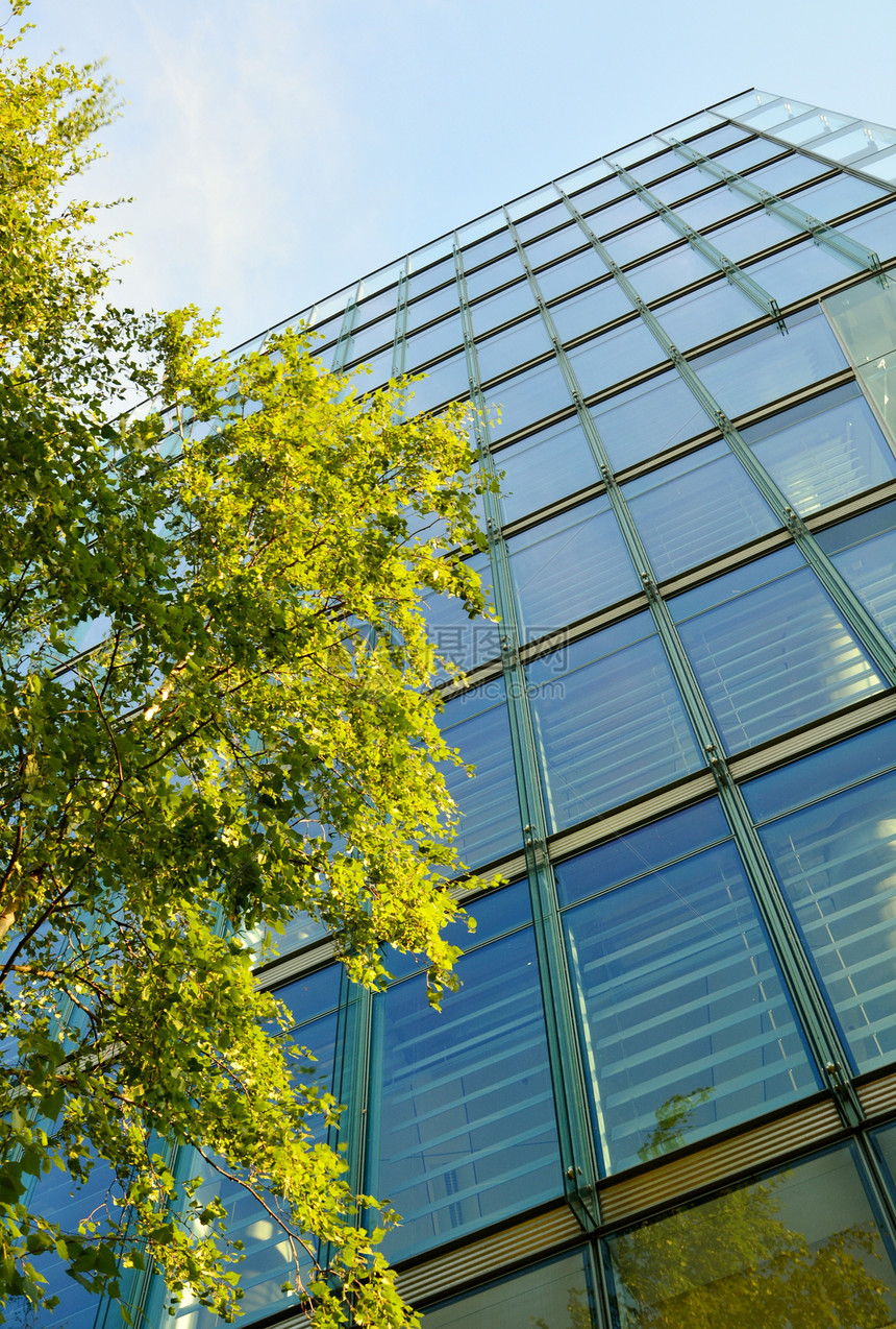 现代办公大楼玻璃面罩建筑商业办公室天空反射蓝色房子图片