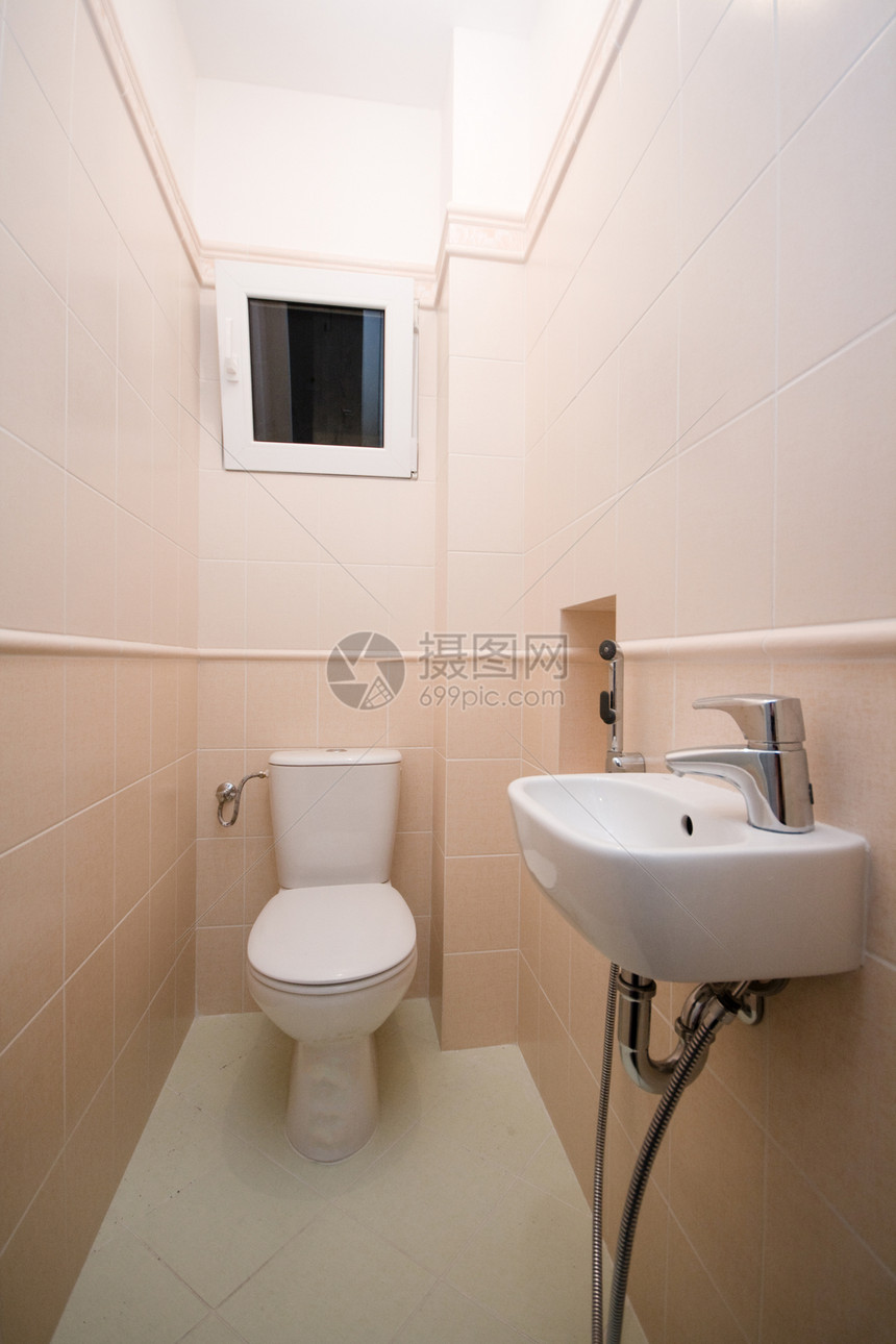 卫生间厕所洗手间水龙头白色棕色瓷砖图片