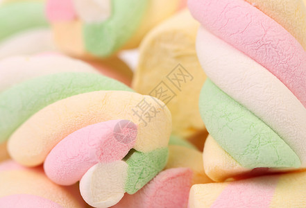 不同颜色的棉花糖糖果孩子食物正方形黄色水果童年蓝色软糖甜点背景图片